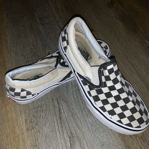 Black and white checkered slip on vans